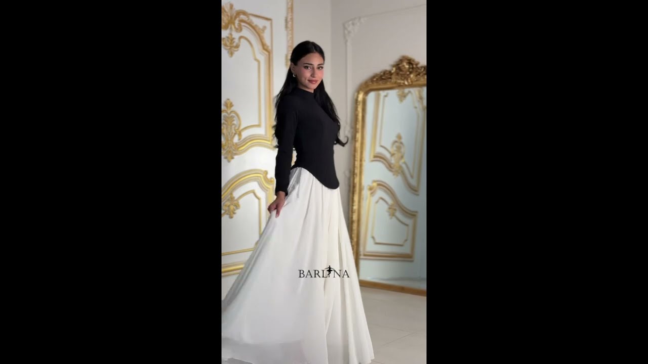 Elegant black and white dress with a high neck - XXL