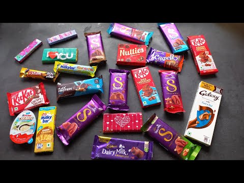 100 candies opening, chocolate a video, lots of chocolates, Cadbury celebration, surprise toys