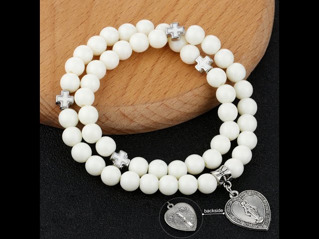 Vídeo relacionado con Gamtic Collar Rosario Mujer Virgen María - Medalla Virgen Milagrosa y Cruz y Religioso Crucifijo Medalla de la Virgen María Y Cadena Collar Regalo para Ella Mujeres Niñas Navidad, talla única, Acero