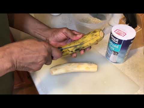 American Lady cooking Nigerian Beans And Rice With Fried Plantain