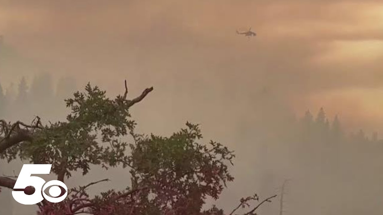 Thousands evacuate as California wildfires spread