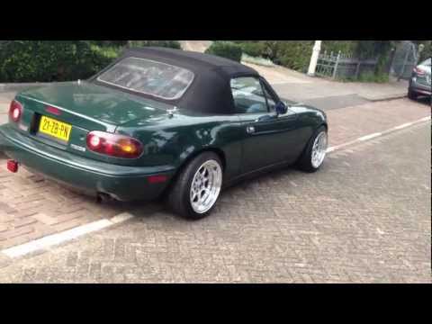 Mazda Miata NA 1995 with 15x8 XXR sportmaxx 002 rims