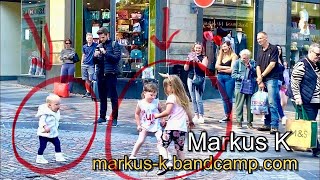 Kids Can’t Resist Busker’s Groove in Inverness - ‘Jumping Jack Flash’ (Stones)