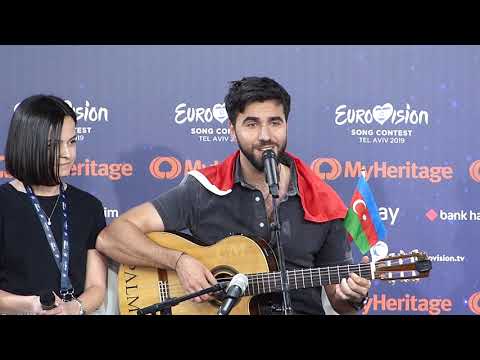 Chingiz singing 'Milim'  (Harel Skaat) during Press Conference (Tel Aviv)