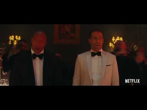 Red Notice masquerade ball trailer still matching the nuevo-tango cues