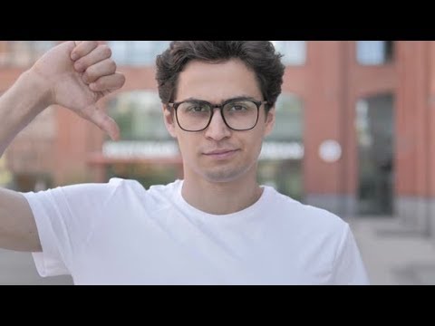 Thumbs Down by Young Man Standing Outdoor | Stock Footage - Videohive