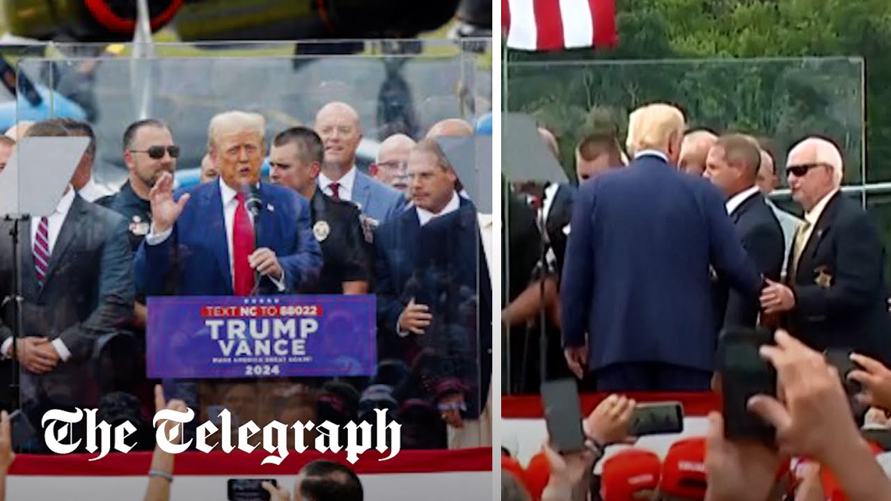 Trump fails to stay behind bulletproof glass at rally
