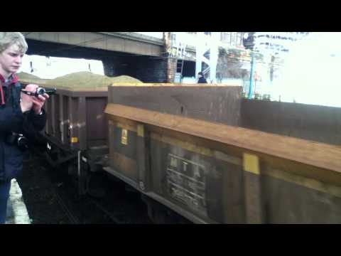 EWS Class 66, 66147, Passes through Carlisle.