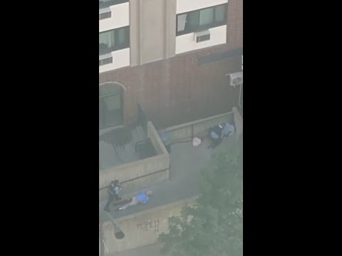 Video shows people on the ground during Minneapolis shooting