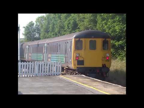 37401 With DRS Coaching Stock At Barrow In Furness 18/7/17