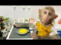 Monkey Baby Bim Bim go to the supermarket to buy kitchen utensils and eats eggs with puppy