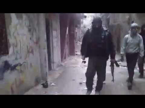 توجه عناصر كتيبة أحفاد سيدنا الحمزة لاقتحام مخيم فلسطين في مدينة دمشق