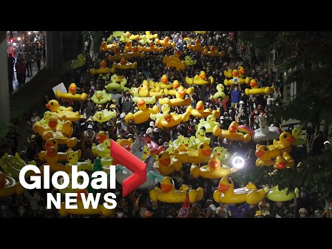 Thai protesters march to army barracks against king's military power