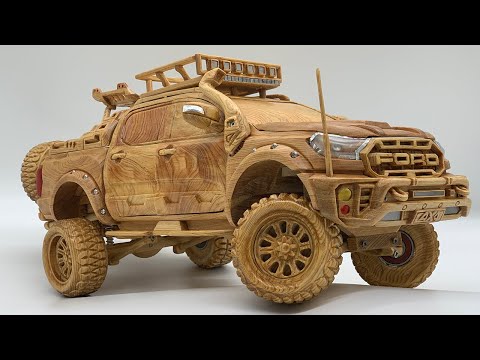 wood carving artist making ford raptor by woodworking art