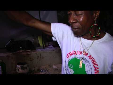 SAS Leads Libation at Male Holocaust Dungeons Cape Coast Ghana Tour Oct 2013