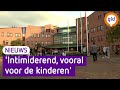 Omstanders proberen bus met asielzoekers tegen te houden