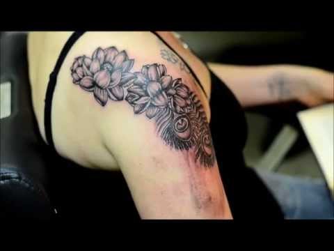 Lotus & Peacock feather Tattoo - By Alp Özalp