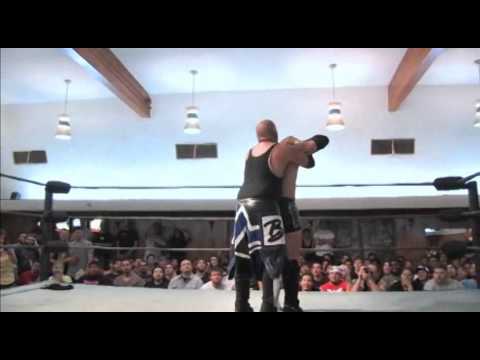 Arm Trap Dragon Suplex