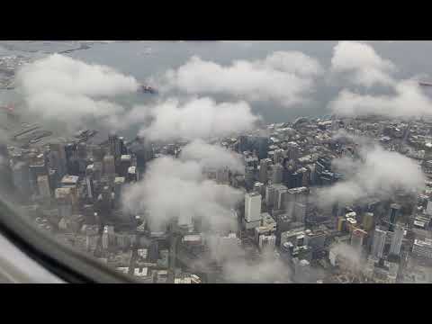 B737 AS929 flying over downtown Seattle toward SEA, 2021-03-21
