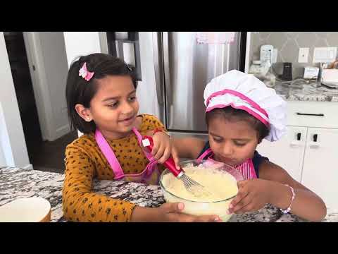 Birthday cake baked by little girls