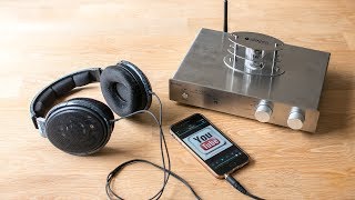 Does a headphone (e.g. Sennheiser HD600) improve with a dedicated amp?