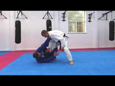 Setting up Butterfly/ Half Guard from Open Guard (Dinu Bucalet)