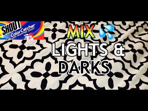 YouTube video about: Can I mix white and colored clothes in the dryer?