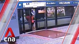 Woman forces platform doors open, tries to pry open MRT doors after missing train