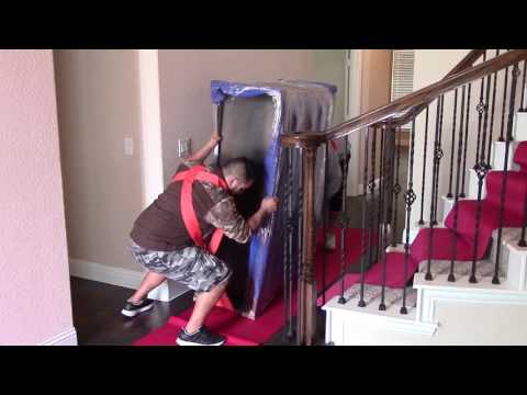 Part of a video titled Moving Up A Heavy Dresser One Flight Of Stairs - YouTube