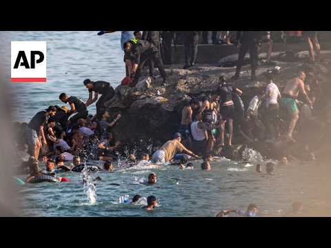 Invasion of Spain - Thousands Breach Morocco's Border, 9 die