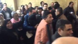 Families celebrate the acquittal outside the courtroom last Monday.