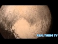 Pluto revealed with surface 11,000 foot mountains ...