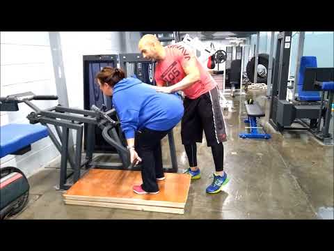 deadlift using a lever machine