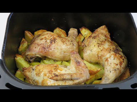 Chicken with potatoes in an air fryer.
