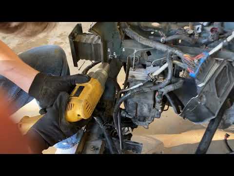 Radiator core support removal on a Mustang GT. Learn how to drill out spot welds.