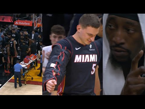 Bam Adebayo prays for Nikola Jovic after hard fall and walks off with arm in brace
