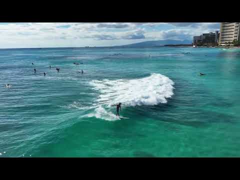 Surfing off the coast of Waikiki, Oahu in Hawaii.