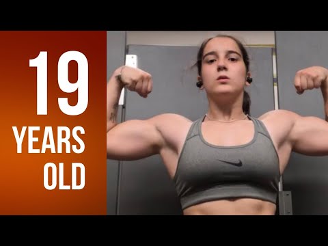 19 years old muscle girl Aiden flexing her big biceps