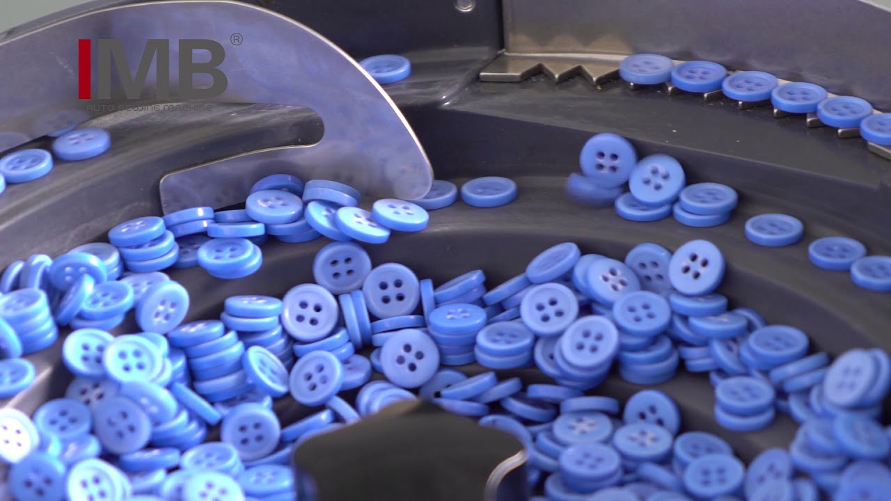 MB6002B IM AUTOMATIC BUTTON FEEDER