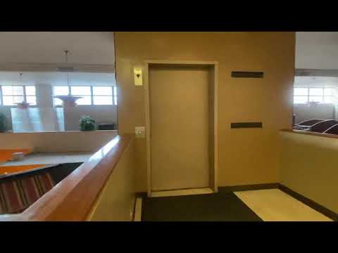 Pull station and fire alarm : riding the 1986 hydraulic US elevator in the bisbee convention center