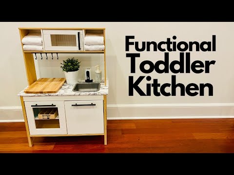 Part of a video titled FULLY FUNCTIONAL MONTESSORI TODDLER KITCHEN | IKEA DIY ...