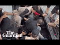 Imran Khan Lifted Into Car After Assassination Attempt In Pakistan