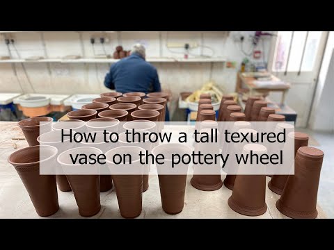 How to throw a tall textured vase on the pottery wheel.