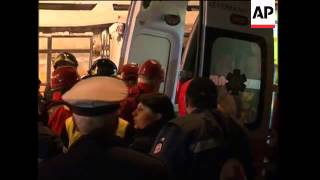 WRAP Night scenes from quake,  new tremor, tents ADDS body