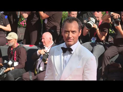 Jude Law arrives for 'The Wizard of the Kremlin' Venice red carpet premiere | AFP