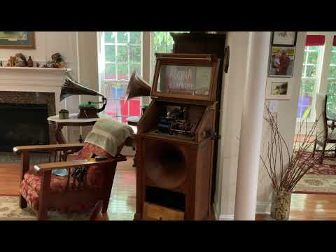 1562.  Listening to “Carolina Sunshine” on the Regina Hexaphone 104