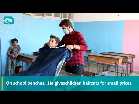 On School Benches He Gives Children Haircut for Small Prices