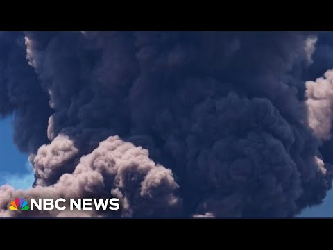 Mount Etna in Sicily erupts sending smoke and ash into air