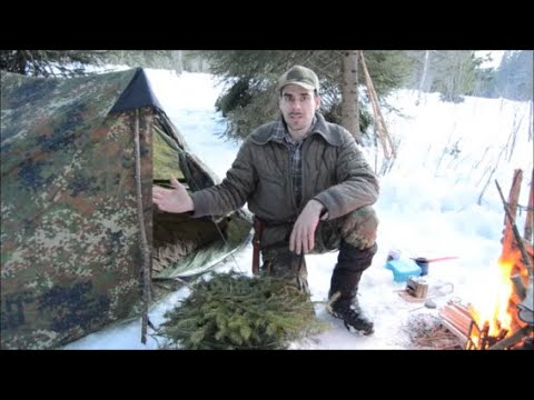 Waldlager mit Zelt und Feuerstelle, Einmannzelt, Regenschutz, Lagerbau | Bushcraft Lexikon