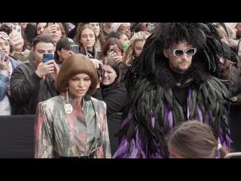 Lisa Rinna and Fredrik Robertsson at the Vivienne Westwood Fashion Show in Paris